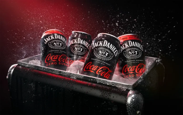 four cans of Jack Daniels & Coca Cola in a cooler
